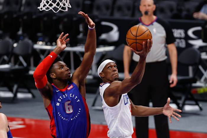 Apr 14, 2021; Detroit, Michigan, USA; LA Clippers guard Rajon Rondo (4) shoots on Detroit Pistons guard Hamidou Diallo (6) in the second half at Little Caesars Arena. Mandatory Credit: Rick Osentoski-USA TODAY Sports